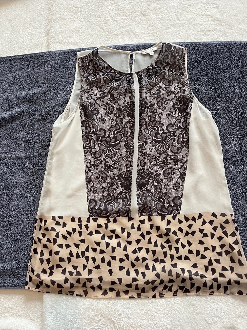 CAbi Sleeveless Mixed-Print Tunic in Black, Cream, Beige